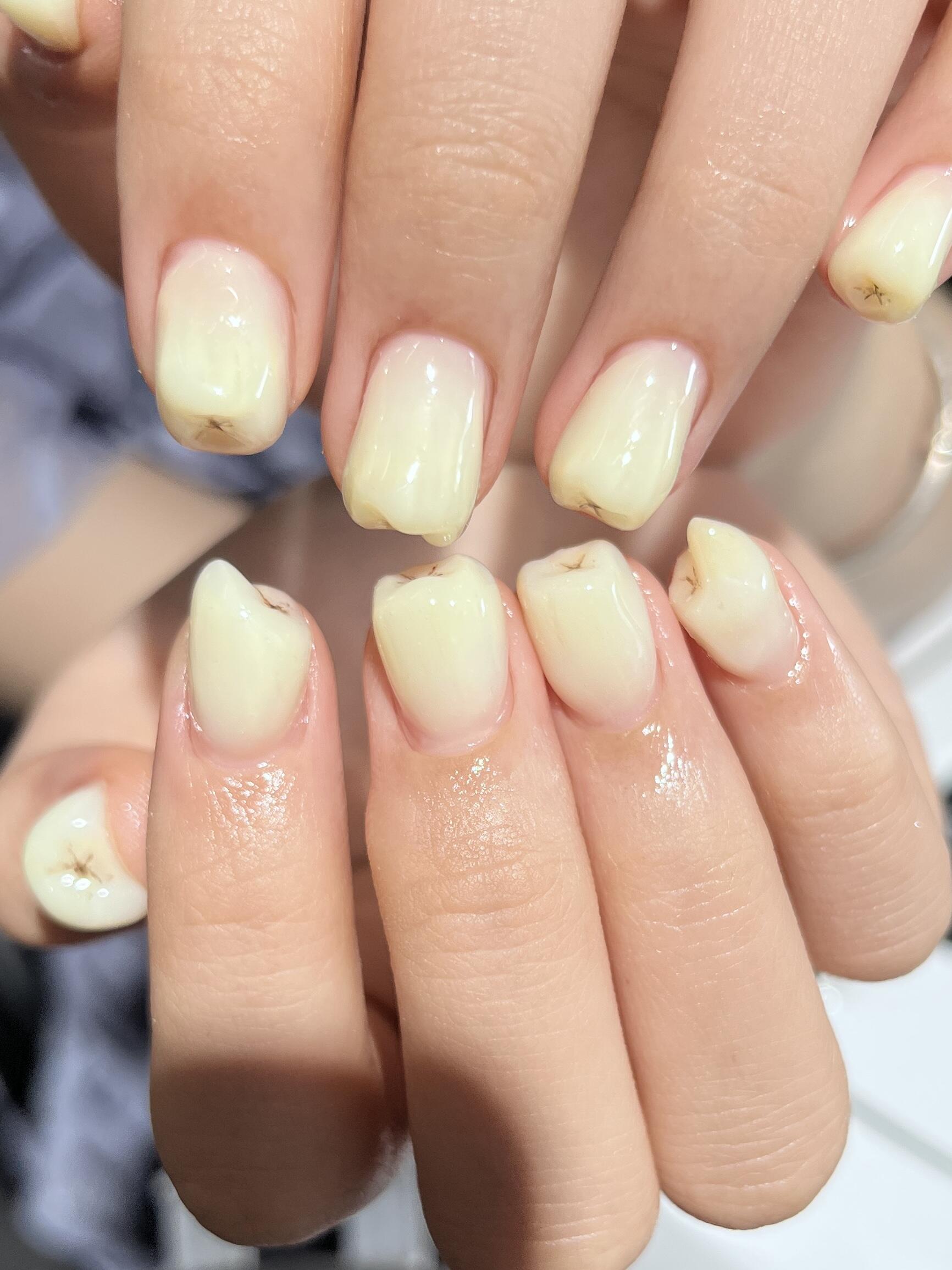 Soft pink aura nail designs on natural nails showing halo gradient effect